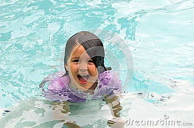 Happy girl swimming Stock Photo