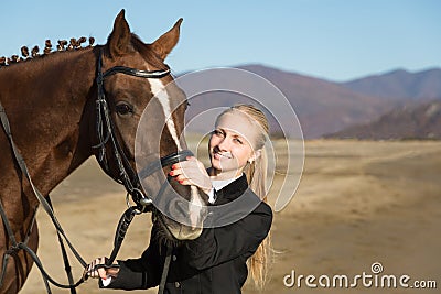 Happy girl teenager with his horse Stock Photo