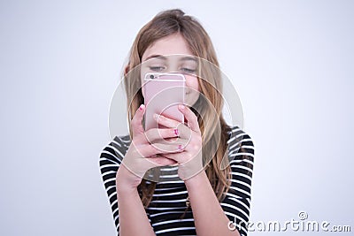 Happy girl using your smartphone Stock Photo