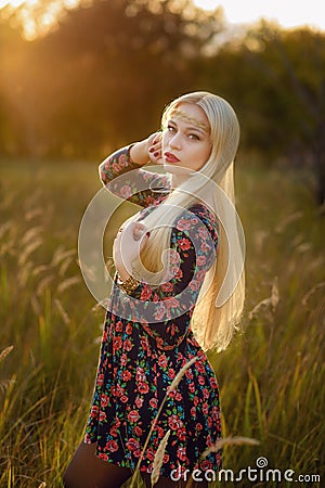 Girl with white long hair in an autumn forest Stock Photo