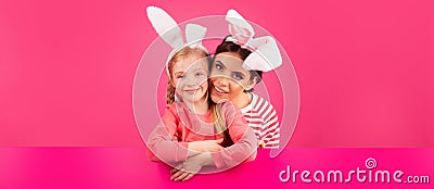 Happy girls with bunny ears. Little sister celebrate easter. Easter banner with copy space. Stock Photo