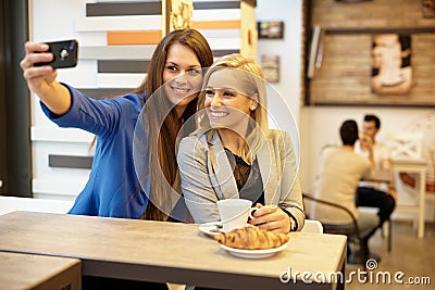 Happy girls making selfie Stock Photo