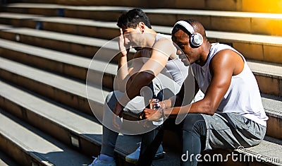 Happy good healthy and wellness concept. fitness, sport, workout people and lifestyle concept. African american and friend white Stock Photo