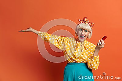 Happy Granny Holding Mobile. Image Of Senior Woman Smiling And Feeling Happy Stock Photo