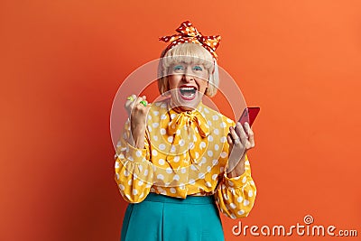 Happy Granny Holding Mobile. Image Of Senior Woman Smiling And Feeling Happy Stock Photo