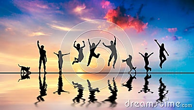 Happy friends, family with dog and cat jumping at sunset Stock Photo