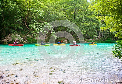 Group traveling by kayak on Acheron river in Greece. Editorial Stock Photo