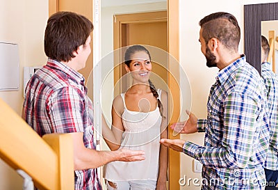 Happy guest saying hello Stock Photo