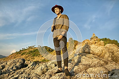 Traveler posing outdoors Stock Photo