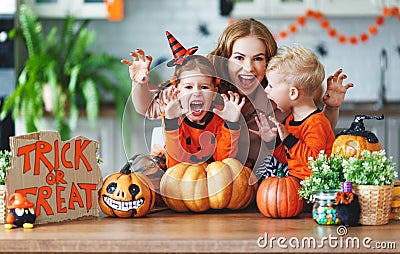 Happy Halloween! family mother and children getting ready for ho Stock Photo