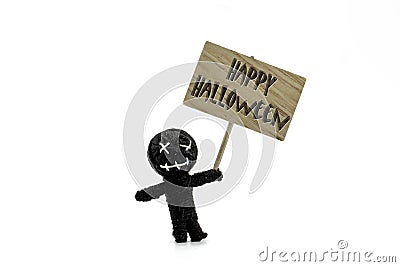 Happy Halloween message on wooden sign with black voodoo doll isolated on white background Stock Photo