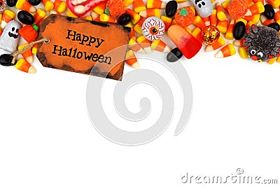 Happy Halloween tag with candy top border over white Stock Photo