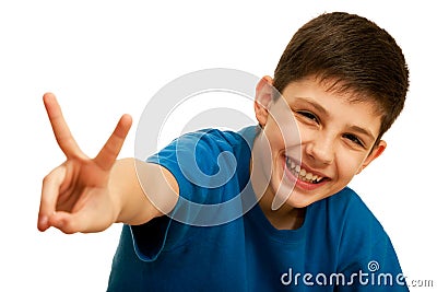 Happy handsome teen showing a victory sign Stock Photo