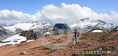 Happy hiker taking in the views. Stock Photo