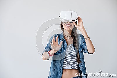 Happy hipster experiencing vr glasses Stock Photo