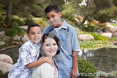 Happy Hispanic Mother and Sons Stock Photo