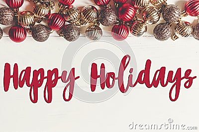Happy holidays text, seasonal greetings card sign. christmas fla Stock Photo