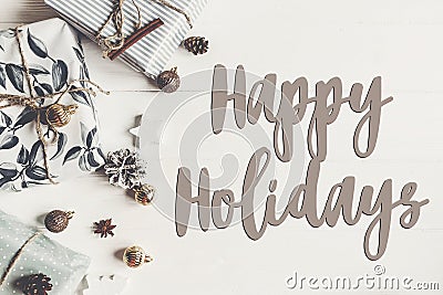 Happy holidays text, seasonal greetings card sign. stylish mode Stock Photo