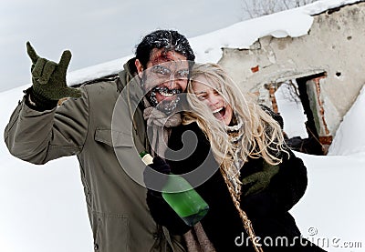 Happy homeless couple drinking Stock Photo
