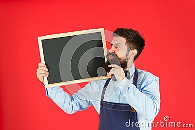 Happy hours bar. Hipster bartender show blackboard copy space. Hipster restaurant staff. Hipster informing you. Man Stock Photo