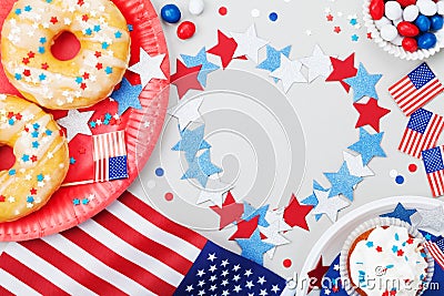 Happy Independence Day 4th july background with american flag decorated of sweet foods, stars and confetti. Holidays table. Stock Photo