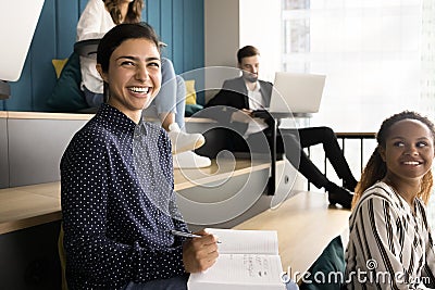 Happy Indian student woman attending educational business training Stock Photo