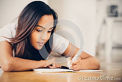 Happy Indian woman student education writing studying Stock Photo