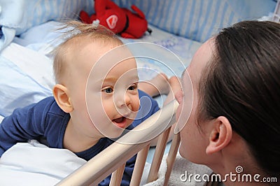 Happy infant with mummy Stock Photo