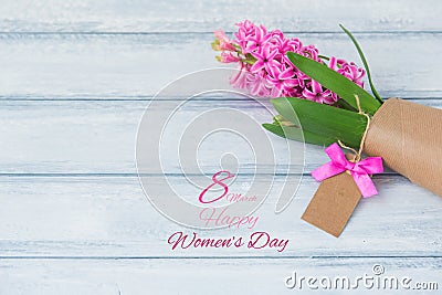 Happy International Women Day, hyacinth over wooden background Stock Photo