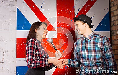 Happy Interviewer Shaking Hands with Guest Stock Photo