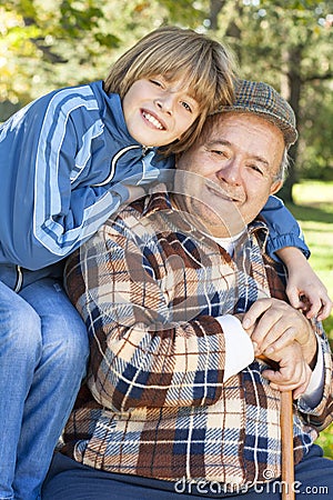 Happy and jolly grandfather and grandson Stock Photo