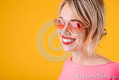 Happy joy emotions pink and yellow woman. Positive bright huge teeth smile Stock Photo