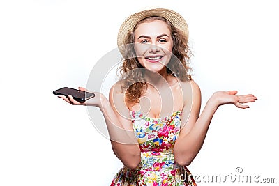 Happy joyfull ecxited girl with raised hands and summer clothes on white background Stock Photo