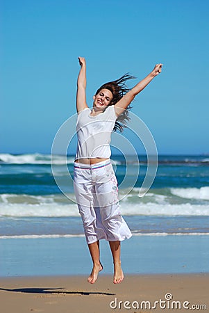 Happy jumping woman Stock Photo