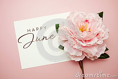 Happy June typography text with flowers on pink background Stock Photo
