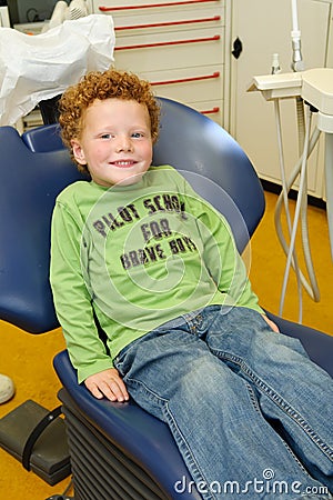 Happy kid at dentist Stock Photo