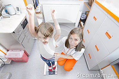 Happy kid at doctor visit Stock Photo