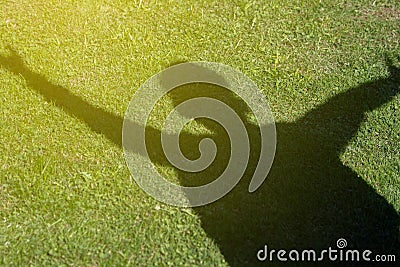 Happy kid jumping shadow silhouette, happiness Stock Photo