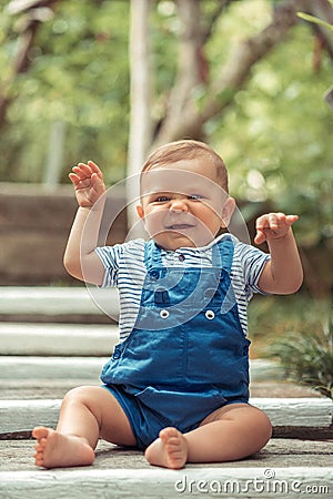 Happy kid laughing. Emotion face joy child. Close up portrait. Little boy smiling. Joyful, funny spring,summer day Stock Photo