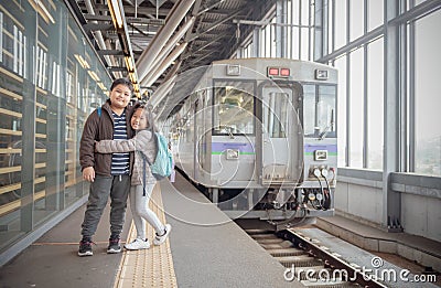 Happy kid traveler with old japan train Stock Photo