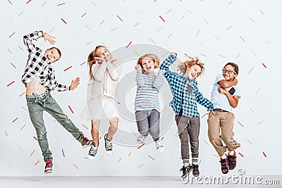 Happy kids jumping Stock Photo