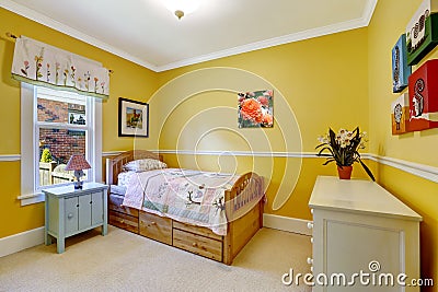 Happy kids room in bright yellow Stock Photo