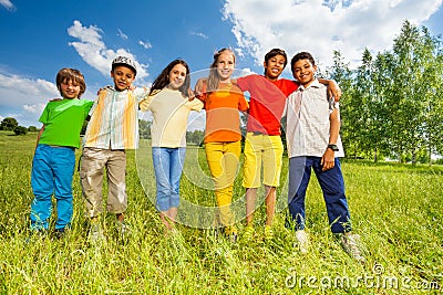 Happy kids standing in a row straight Stock Photo