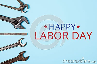 Happy labor day concept. Banner with Different wrenches on blue background Stock Photo