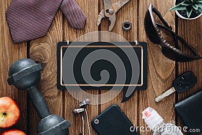 Happy Labor Day Fitness and healthy active wellness lifestyle background concept. Gentleman`s accessories, dumbbells, and apples Stock Photo