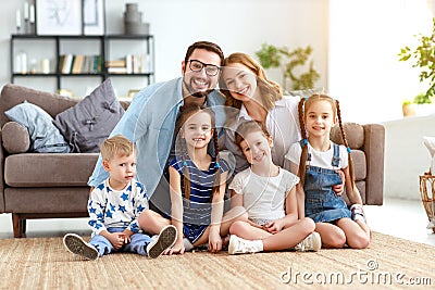 Happy large family mother father and children at home Stock Photo