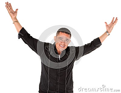 Happy latino man with raised arms Stock Photo