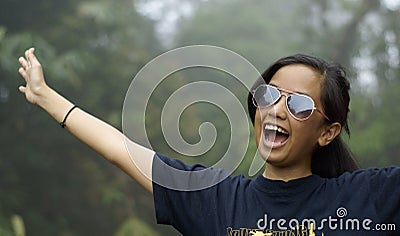 Happy laughing asian teen girl Stock Photo