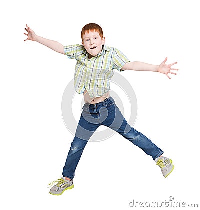 Happy laughing boy jumping on white isolated background Stock Photo