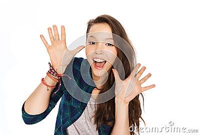 Happy laughing pretty teenage girl showing hands Stock Photo